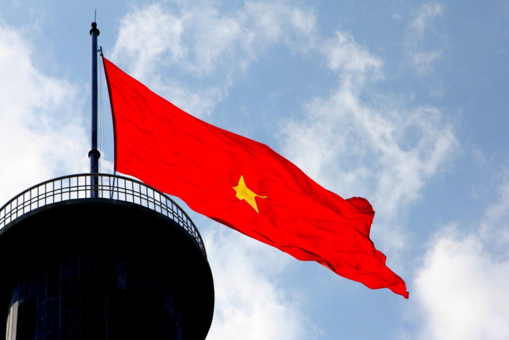 The Vietnamese flag flying at the top of Lung Cu Flag Tower, the northernmost point of Vietnam.