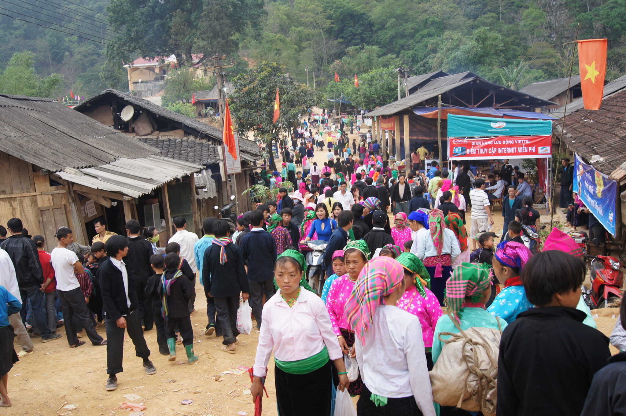 Ethnic minority people in colorful traditional dress at the spring Khau Vai Love Market festival, Ha Giang, Vietnam