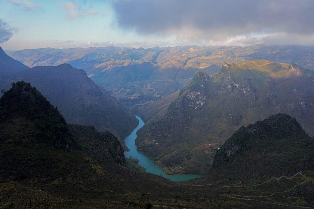 The emerald Nho Que River winding through the canyon below Ma Pi Leng Pass, Ha Giang