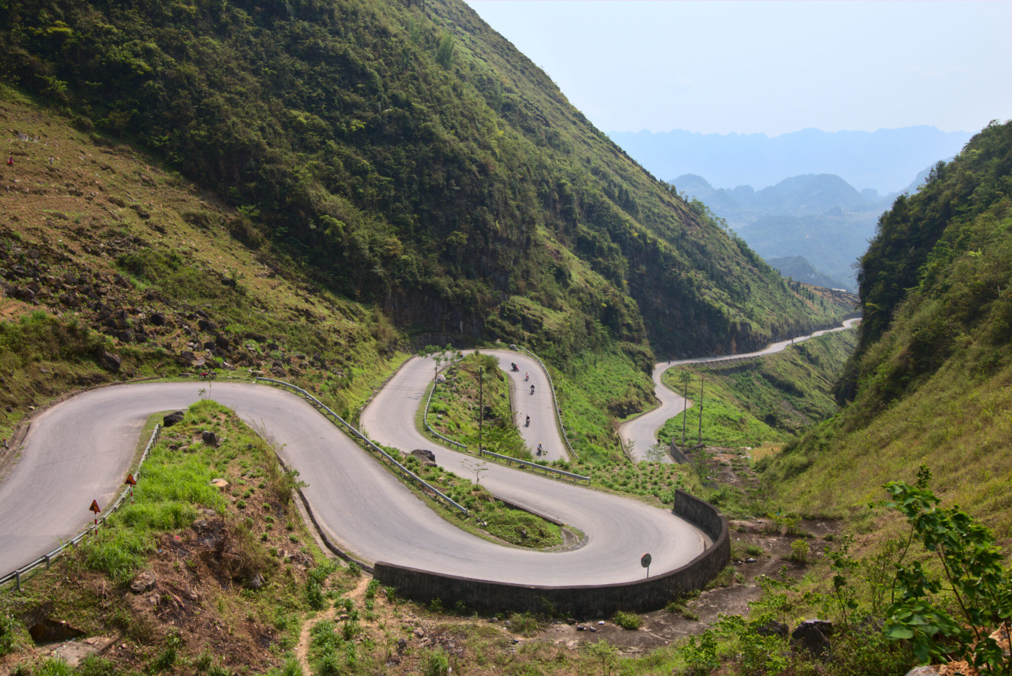 Winding mountain road in Ha Giang province, best enjoyed from the back of an easy rider bike