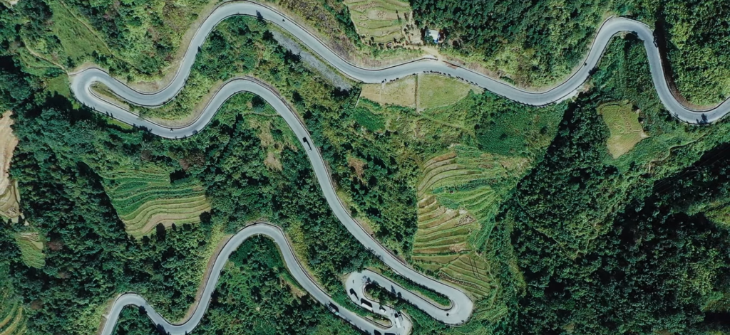 Aerial top-down view of the switchback road at Ma Pi Leng Pass, Ha Giang, Vietnam